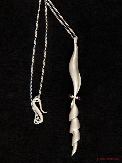 Albino Squid Pendant in Ruby